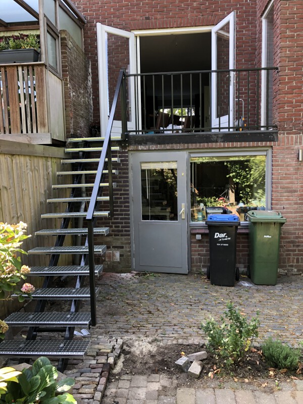 Traprooster met leuning